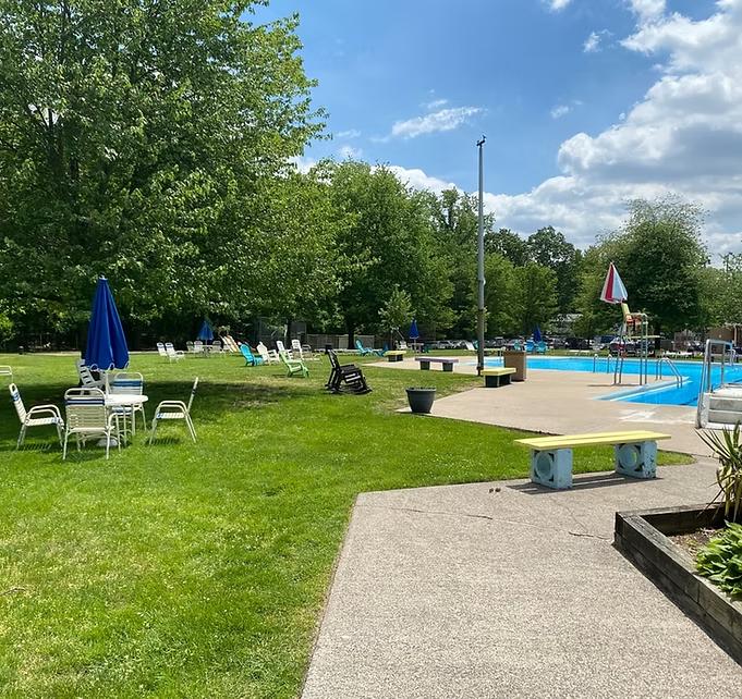 Outdoor swimming pool and lawn at Oradell Swim Club